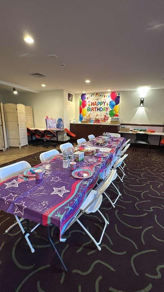 Purple-themed party table setup
